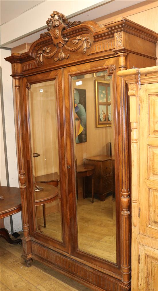 A 19th century walnut armoire, W.140cm